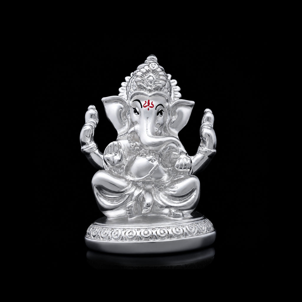 Four Arm Seated Ganesha Brass Idol Silver Finish
